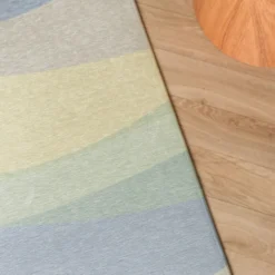 Geometrischer Teppich - Swing Waves Blau Grün