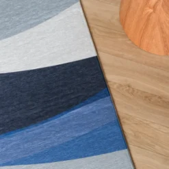 Geometrischer Teppich - Swing Waves Blau