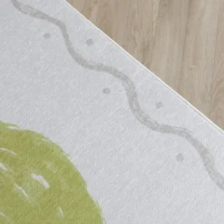 Waschbarer Kinderteppich - Mick Limette Grün