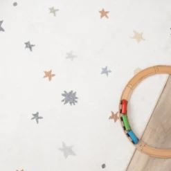 Waschbarer Kinderteppich - Ravi Stars Bunt
